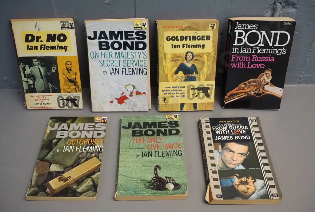 7 retro paperback editions of James Bond novels - earliest is 1964, general wear & minor damage Image 1++
