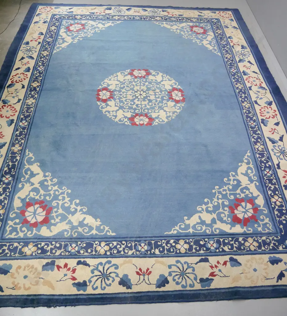 large Chinese wool floor rug - blue, cream and red floral motifs. Wear to edges. L-3490 W-2780 Image 1++