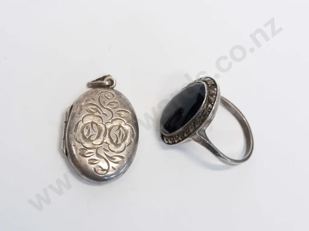 silver ring [stamped sterling] & silver locket no chain stamped anchor, lion & ? Image 1++
