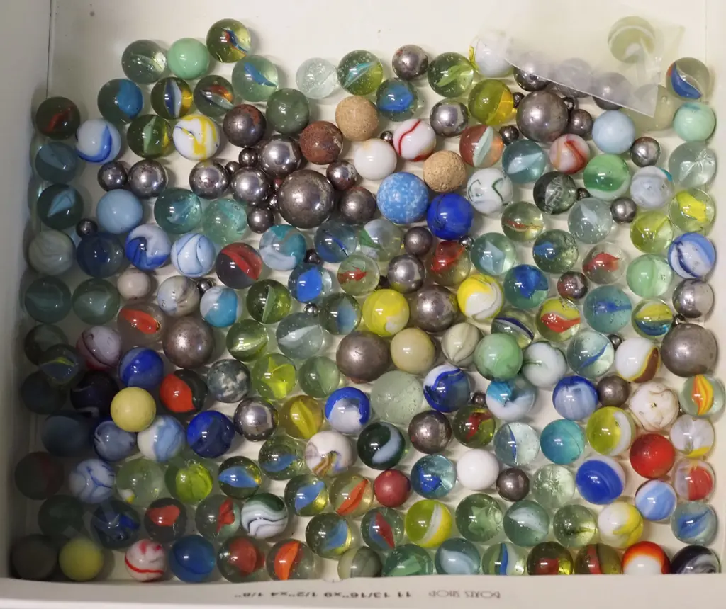 assorted vintage glass and stone marbles, including one uranium glass, some metal bearings, etc. Image 1++