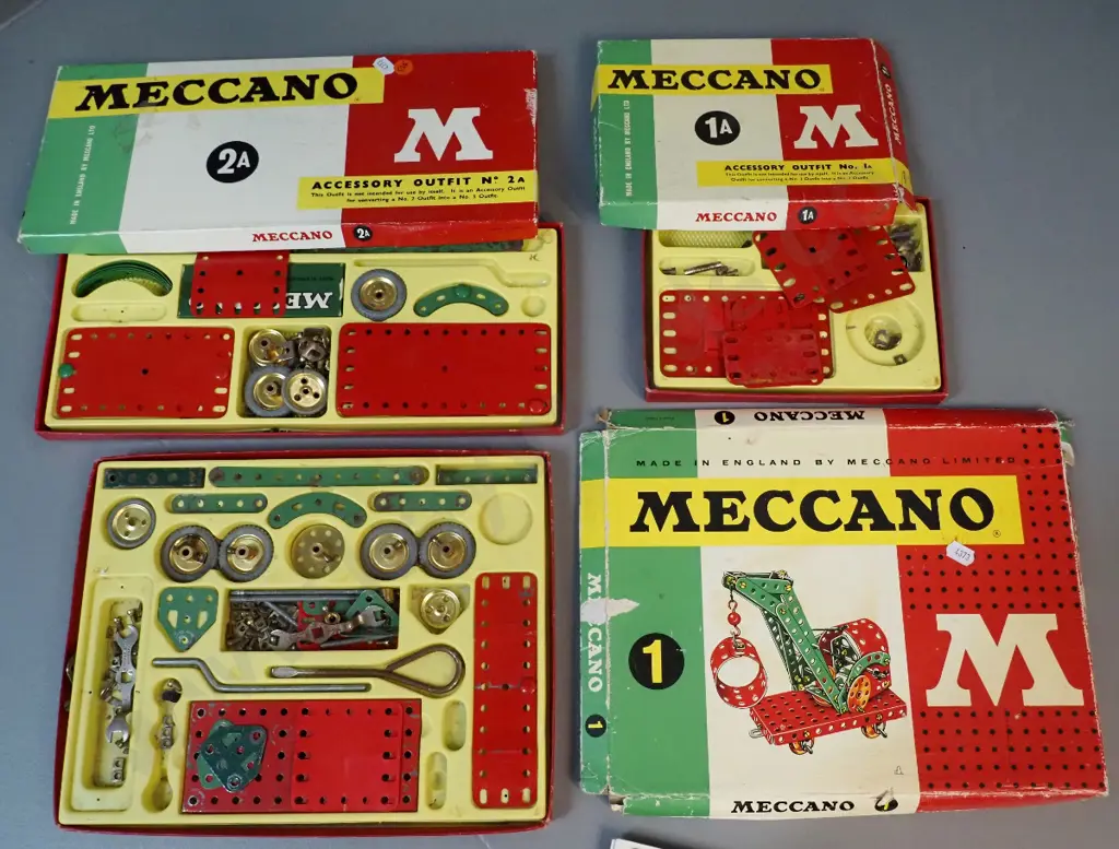 3 boxes of Meccano with various instruction booklets, looks like contents not complete Image 1++