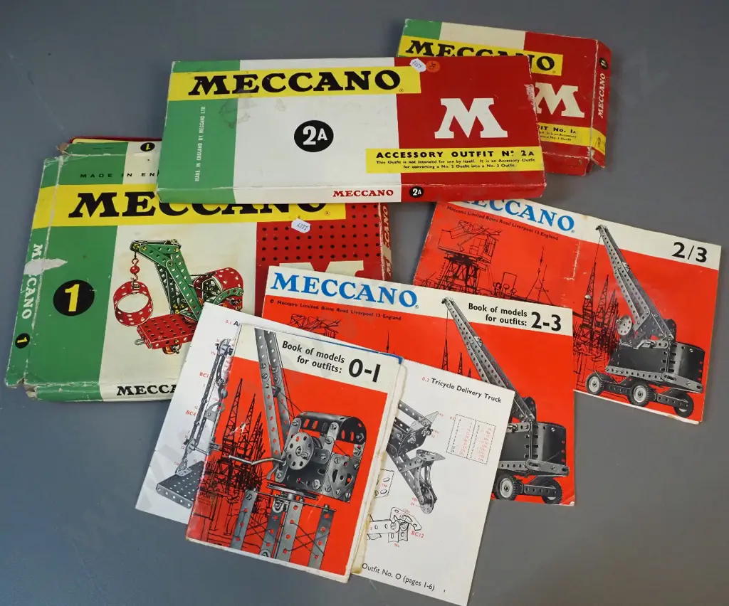 3 boxes of Meccano with various instruction booklets, looks like contents not complete Image 1++