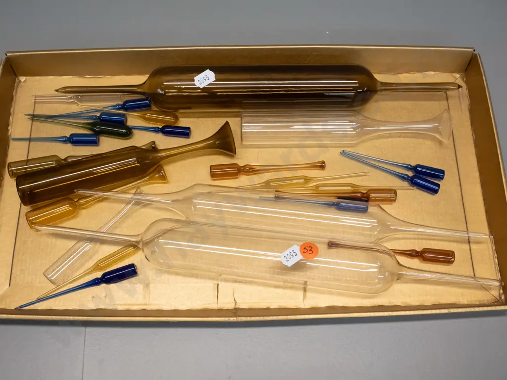 assorted delicate laboratory glassware items, coloured and clear, longest pipette is L-350 Image 1++