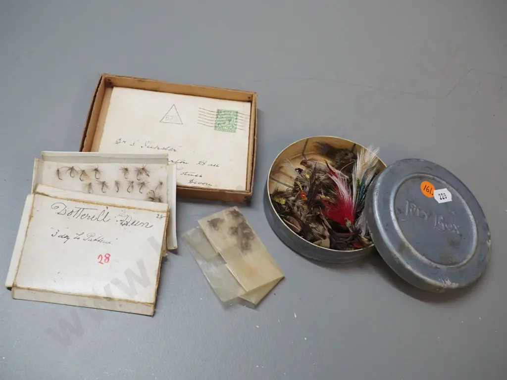 aluminium tin of fishing flies marked "Fly Box" in relief D-110 and a box of flies marked Walbrans trout and grayling Image 1++