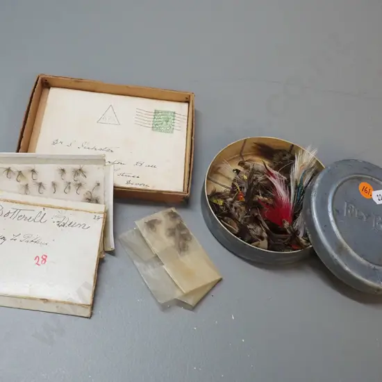 aluminium tin of fishing flies marked "Fly Box" in relief D-110 and a box of flies marked Walbrans trout and grayling