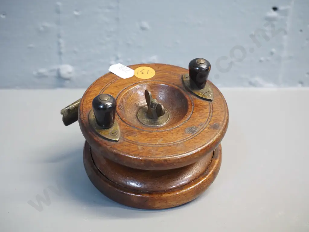vintage brass and timber fishing reel with timber knobs, marked Allcock & Co Redditch - diameter 90 Image 1++