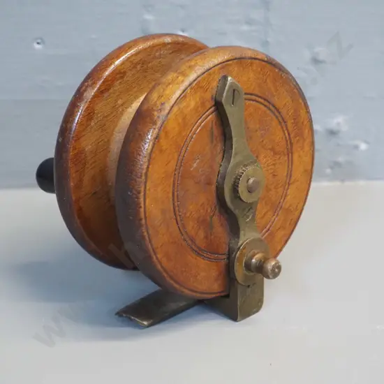 vintage brass and timber fishing reel with timber knobs, marked Allcock & Co Redditch - diameter 90