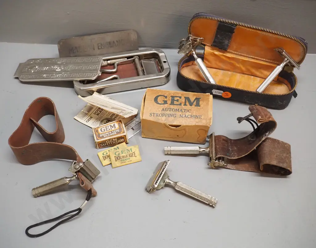assorted vintage shaving equipment - chrome cased Rolls razor, leather strops, safety razors & leather case Image 1++
