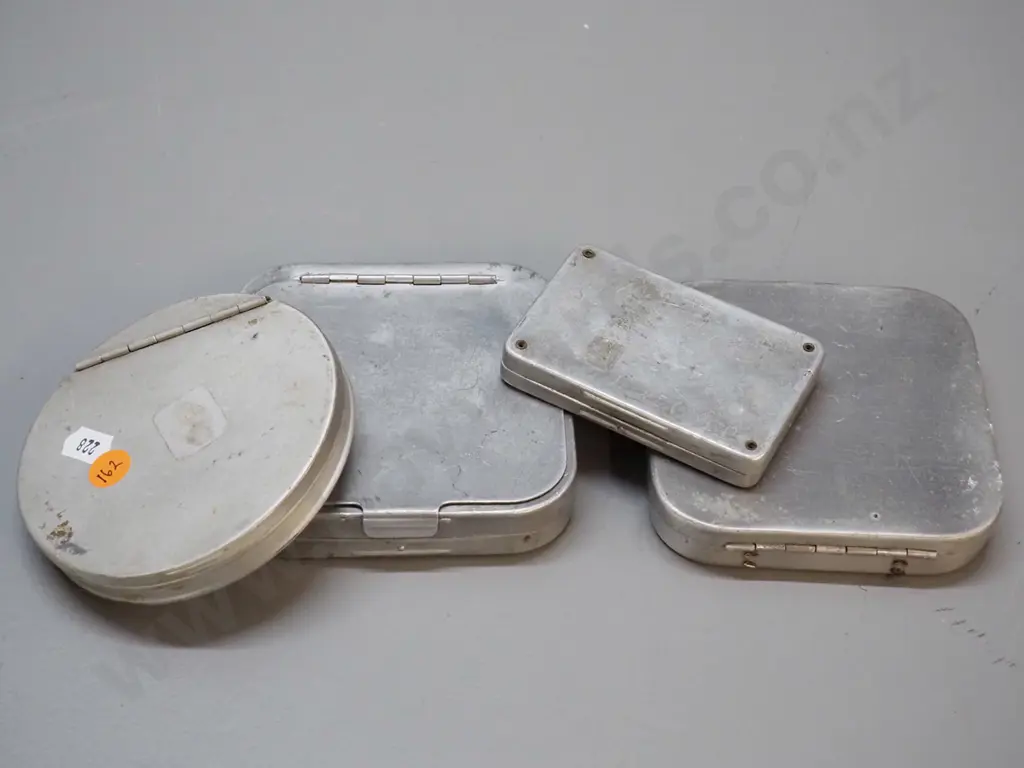 4 aluminium fishing fly containers - 2 with contents, 2 empty, no maker's marks. Largest is 110 x 110 Image 1++