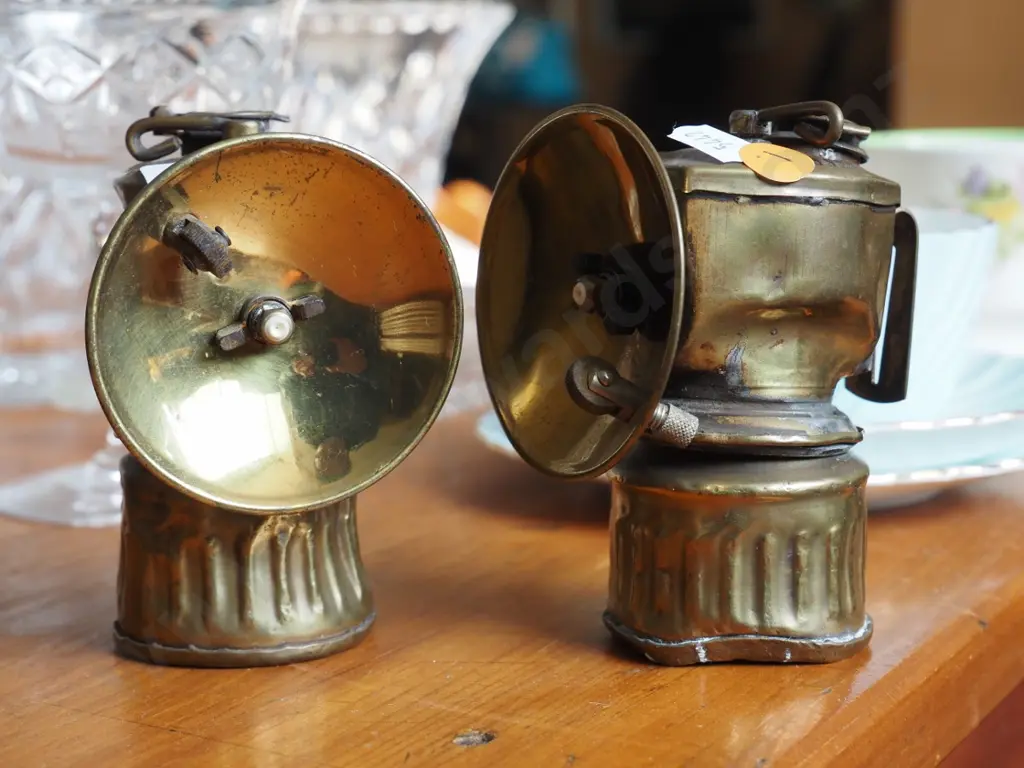 2 small brass miner's lamps - marked Justrite, United States of America - some dents and wear. H-110 Image 1++