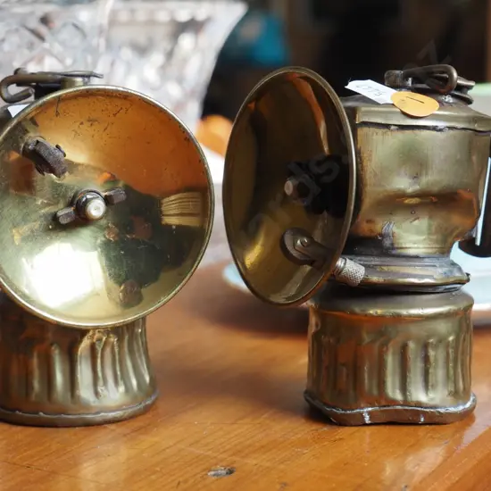 2 small brass miner's lamps - marked Justrite, United States of America - some dents and wear. H-110