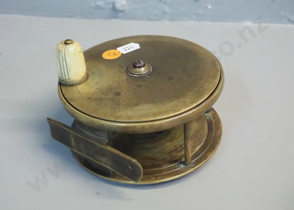 brass fishing reel with (bone?) knob, marked Chas Farlow 191 Strand London, circa 1880 according to note D-115 Image 1++