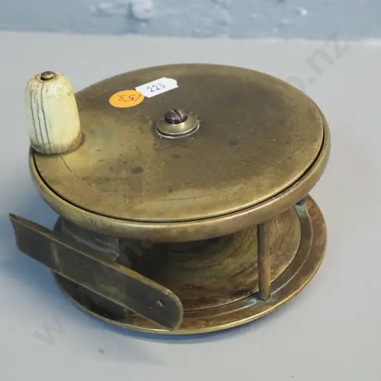 brass fishing reel with (bone?) knob, marked Chas Farlow 191 Strand London, circa 1880 according to note D-115