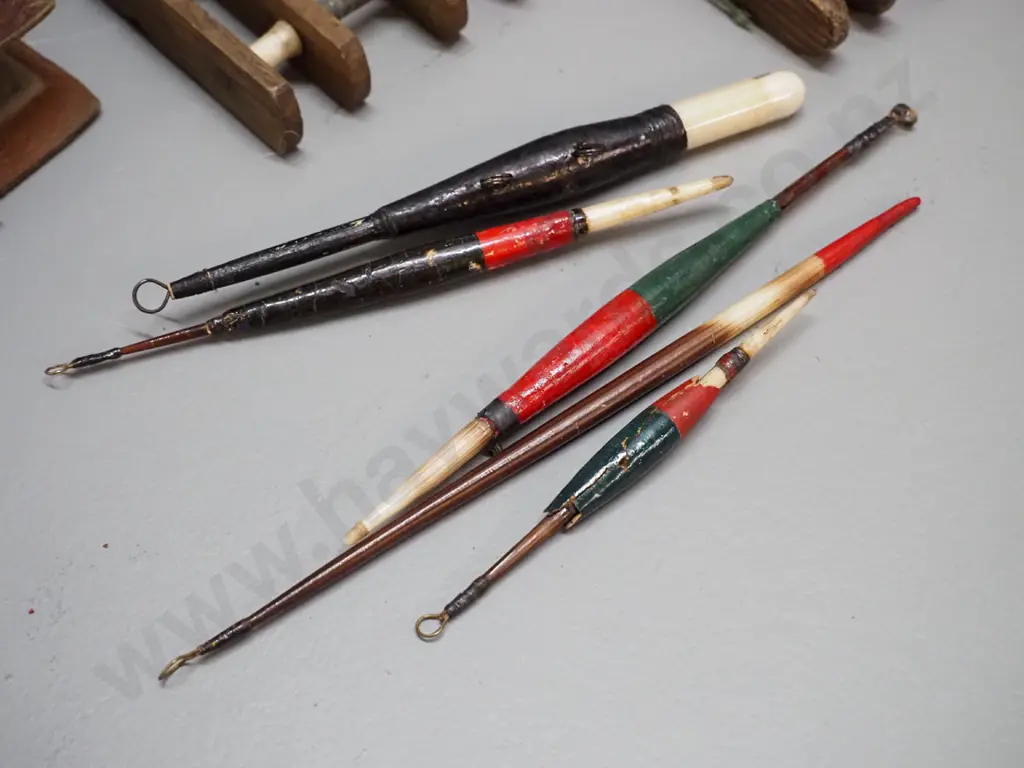 two vintage timber fishing line winders L180 W65 with assorted floats, and 2 leather fly wallets, smaller one with flies Image 1++