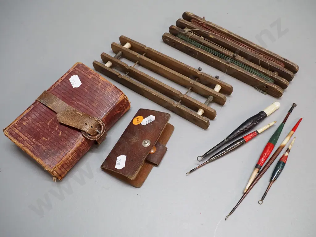 two vintage timber fishing line winders L180 W65 with assorted floats, and 2 leather fly wallets, smaller one with flies Image 1++