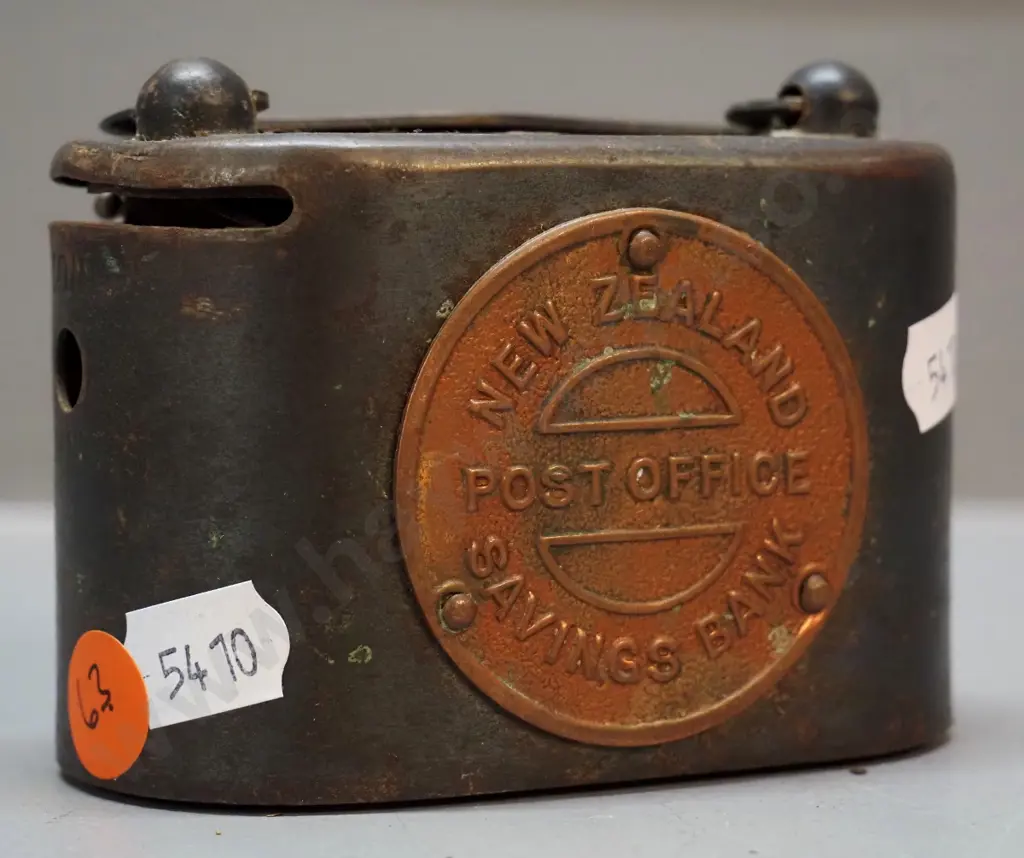 small mixed metal NZ Post Office Savings Bank money box - marked Richardson McCabe Wellington / Burman Ltd Image 1++