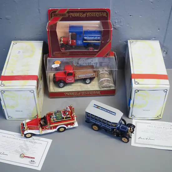 2 Matchbox Collectibles and 2 Models of Yesteryear die-cast vehicles w/original boxes: Santa Claus fire engine, post bus