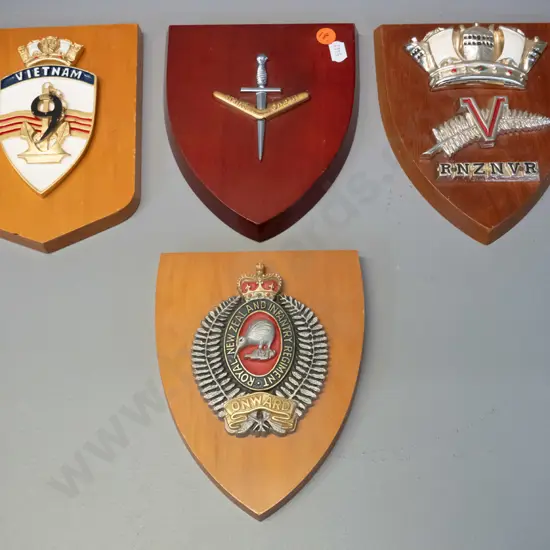 4 military crest timber wall plaques: Royal NZ Infantry, RNZNVR, Vietnam and "Strike Swiftly" - each H-170 W-140
