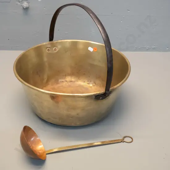 vintage brass jam pan with iron handle and a copper and brass ladle marked Ballarat Australia. Some dents and