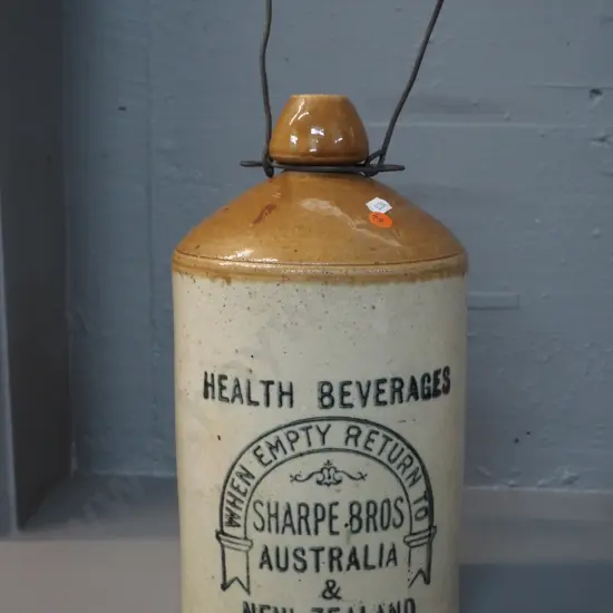 salt-glazed narrow-mouth crock with wire handle - marked Sharpe Bros Australia & New Zealand H-340 D-180