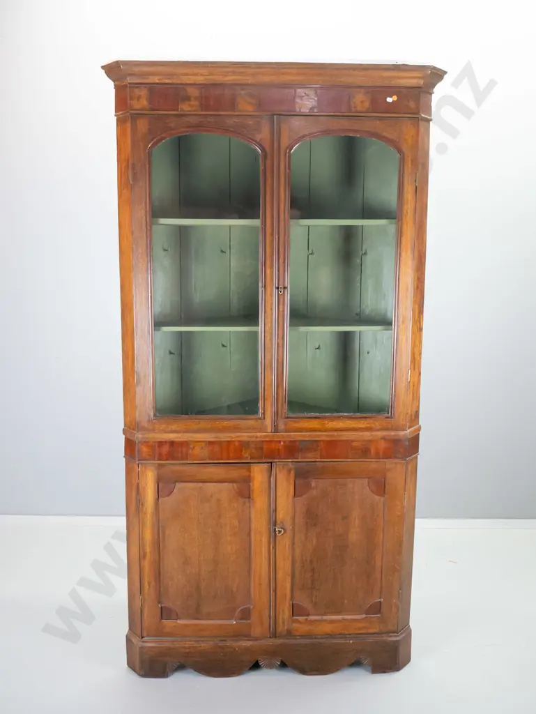 antique oak corner cabinet with 2 solid lower and 2 glazed upper doors, mixed timber veneer border at top, with key Image 1++
