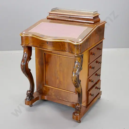 antique rosewood Davenport desk w/ 4 drawers, key escutcheons but no key, brass gallery top, tooled leather insert H870