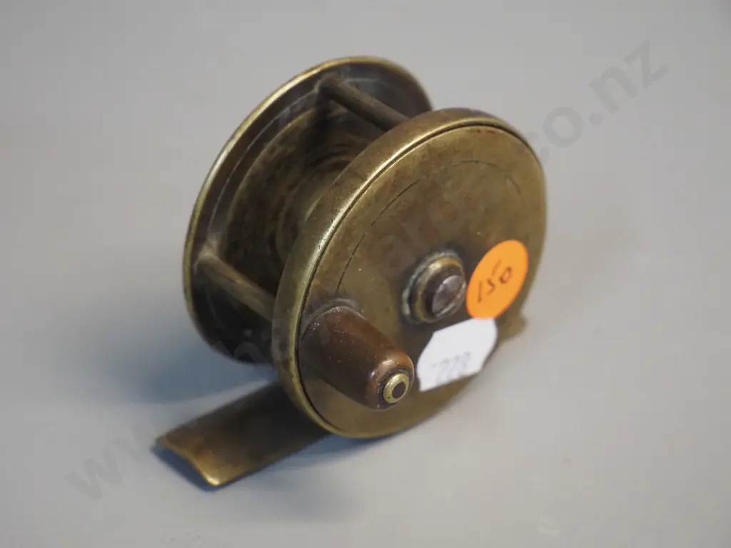 small brass fishing reel marked Chas. Farlow, 191 Strand, London - circa 1890 according to label - diameter 55 Image 1++
