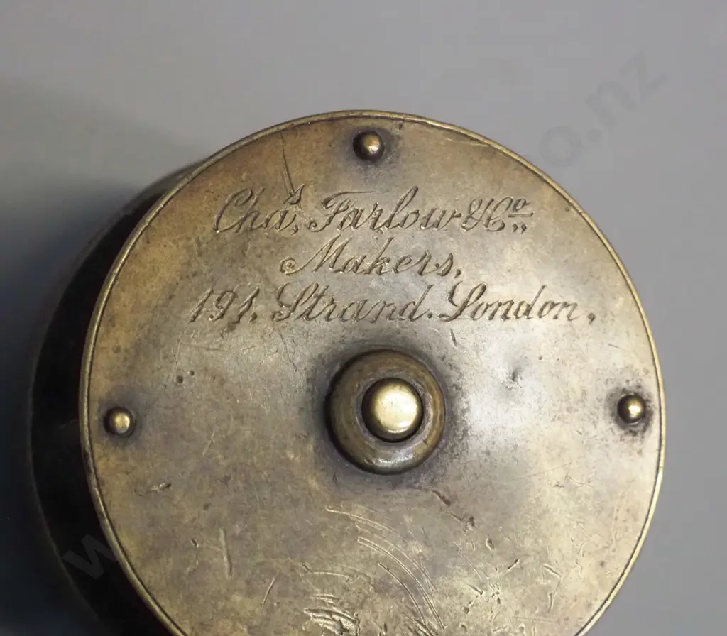 small brass fishing reel marked Chas. Farlow, 191 Strand, London - circa 1890 according to label - diameter 55 Image 1++