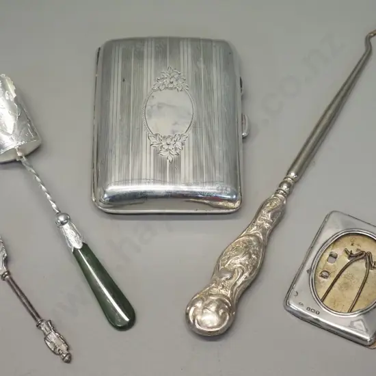5 sterling silver items - cigarette case 85 x 65, sugar scoop w/ greenstone handle, small figural mustard spoon, button