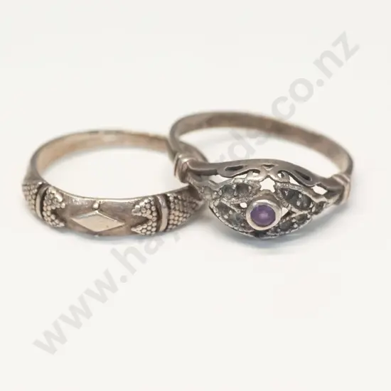 2 silver rings one with small amethyst both stamped 925