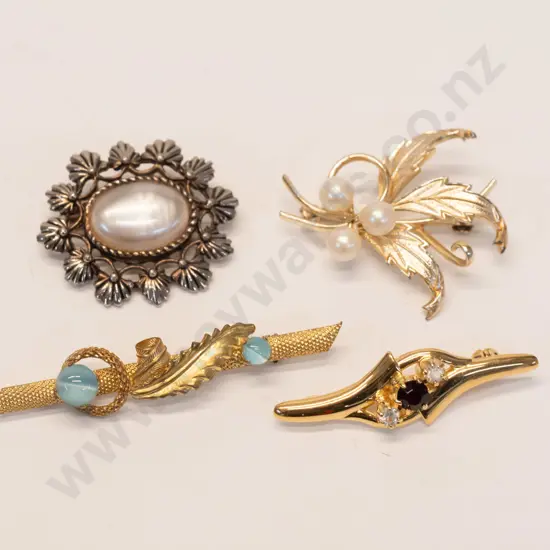 4 costume brooches