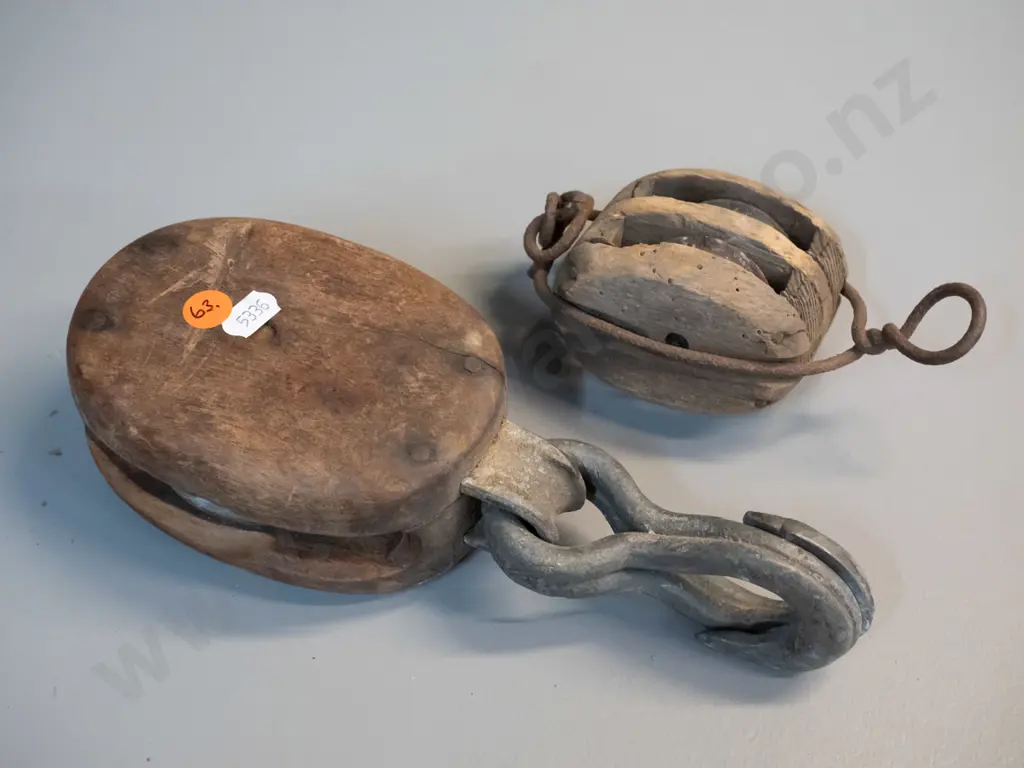2 vintage wood and metal pulleys, one has corrosion and borer holes, larger one is L-240 Image 1++