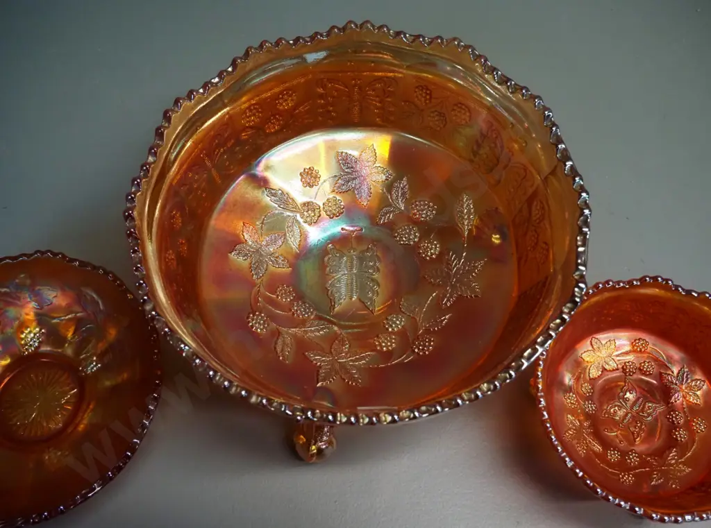 3 marigold colour carnival glass bowls, largest is butterfly pattern footed bowl H-110 D-210 Image 1++