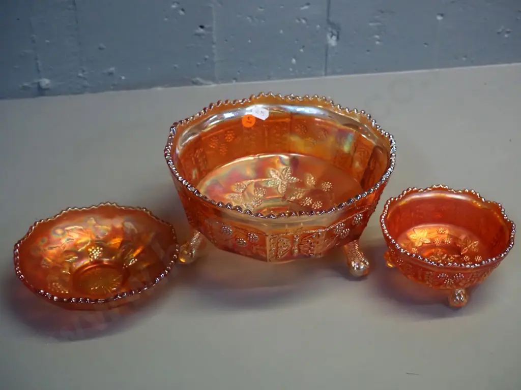 3 marigold colour carnival glass bowls, largest is butterfly pattern footed bowl H-110 D-210 Image 1++