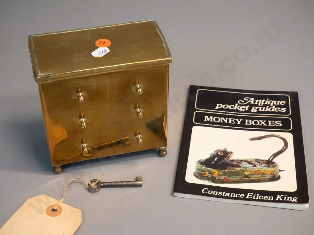 vintage brass money box in the shape of a 4-drawer chest, with key H120 W120 D70 & small book on antique money boxes Image 1++