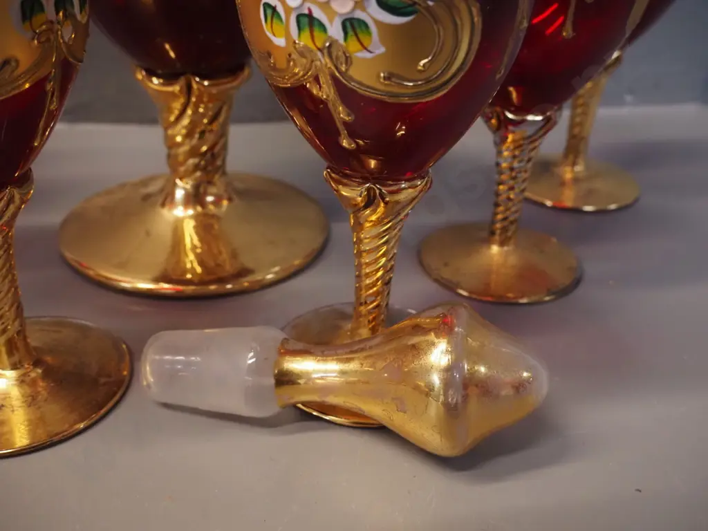 7-piece red Venetian stoppered decanter and 6 glasses H-400, wear to gilt on stopper Image 1++