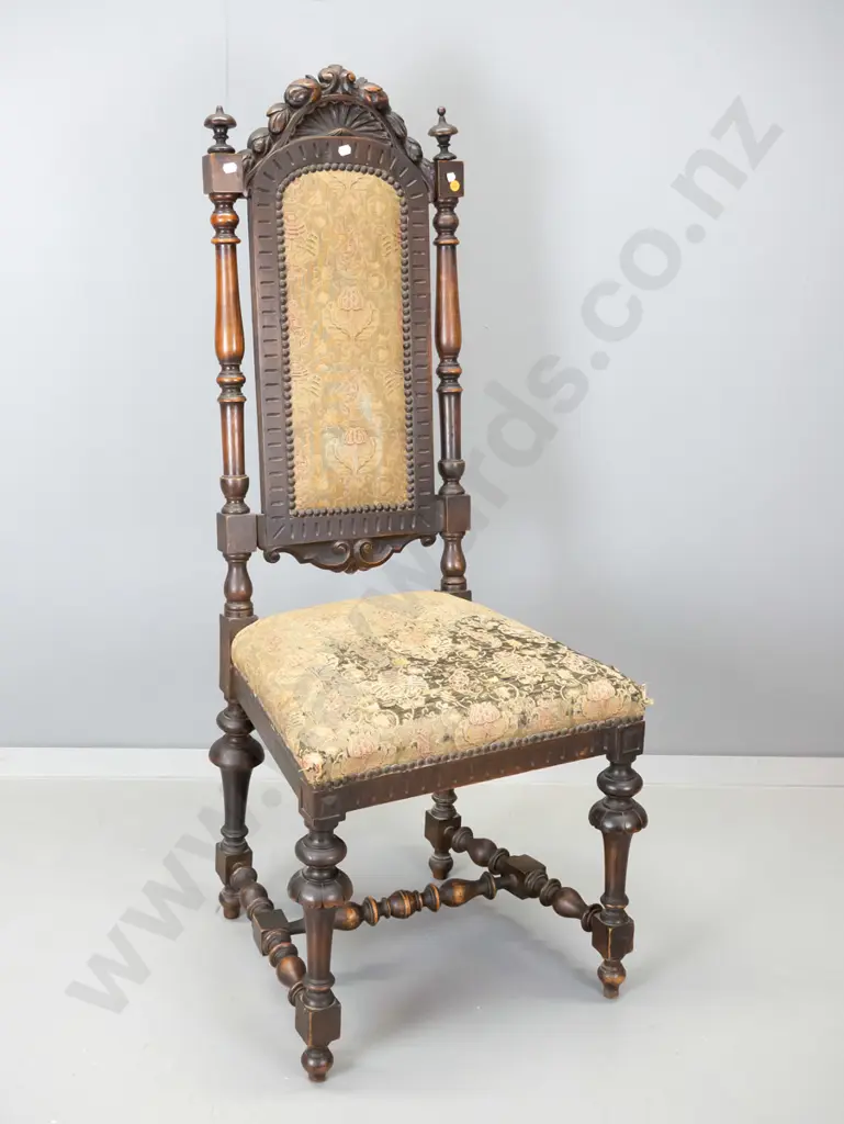 Jacobean style mahogany hall chair w/ carved back, stretcher base, some wear to tapestry fabric on seat. H1160 W460 D400 Image 1++