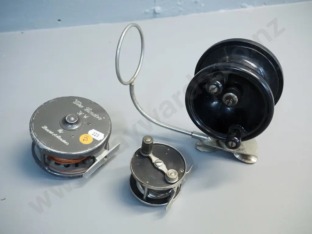 3 fishing reels - aluminium Sharpes of Aberdeen "The Gordon" 2 bakelite and metal reels, larger one L-180 reel D-100 Image 1++