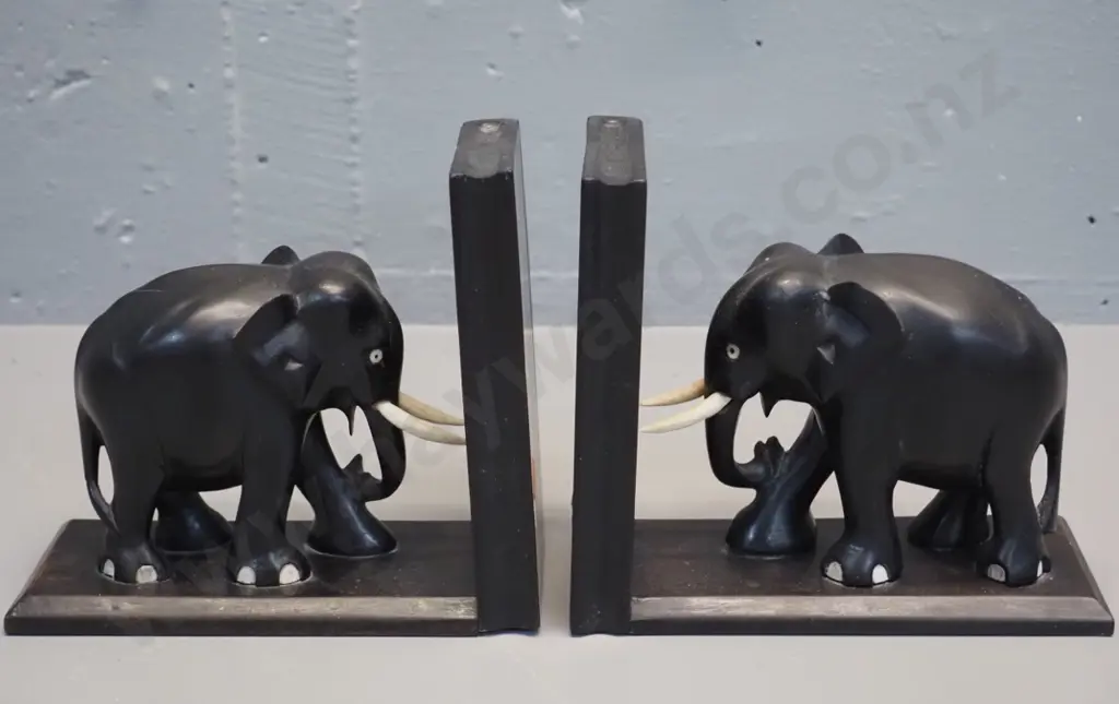 pair of ebonised timber elephant book-ends - one has crack to timber - each H-150 L-170 Image 1++