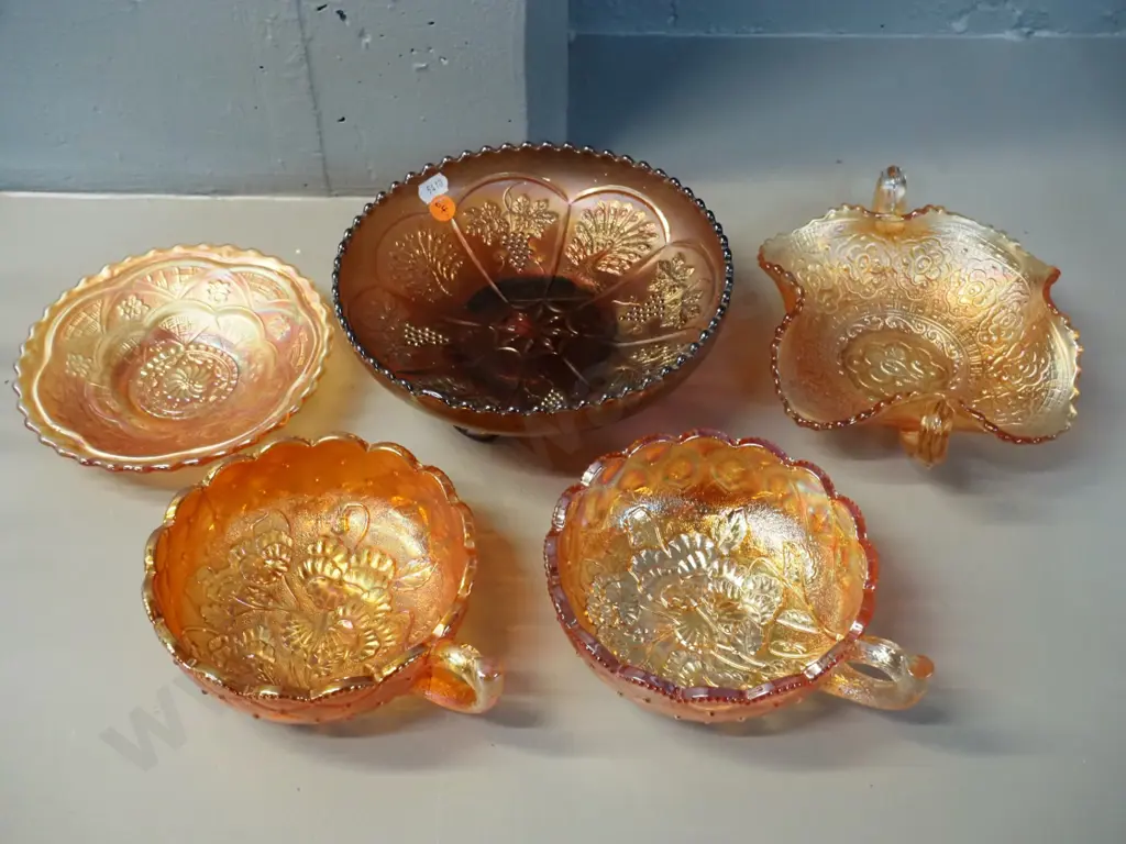 5 pieces of marigold colour carnival glass - bowls and dishes - largest is footed peacock bowl H-80 D-190 Image 1++