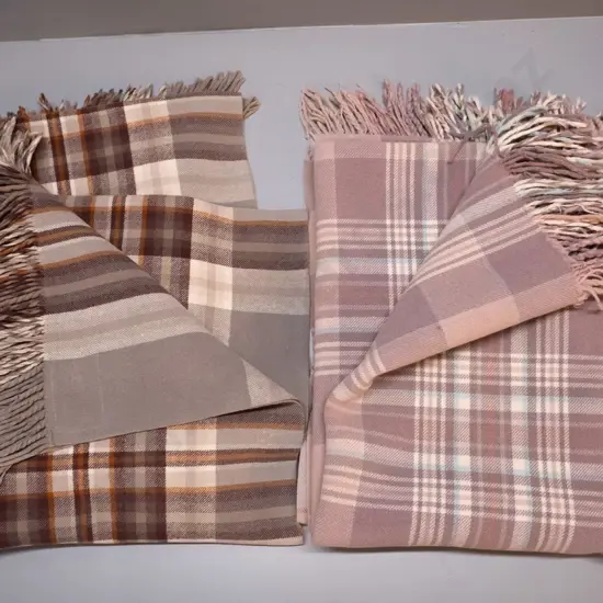 2 retro New Zealand made check woollen blankets - one has small hole, other some staining. One has label but too worn to