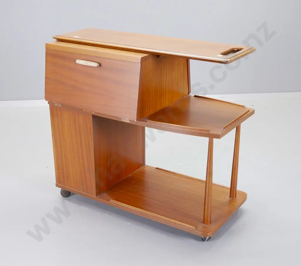 Craftrite NZ mid-century mahogany cocktail cabinet / serving trolley on casters, opens on both sides, w/ gilded metal Image 1++