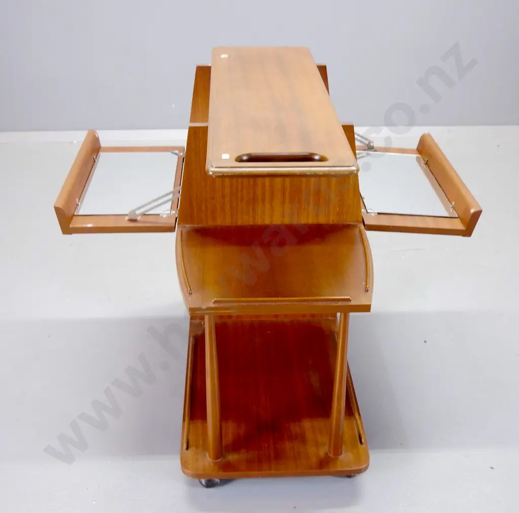 Craftrite NZ mid-century mahogany cocktail cabinet / serving trolley on casters, opens on both sides, w/ gilded metal Image 1++