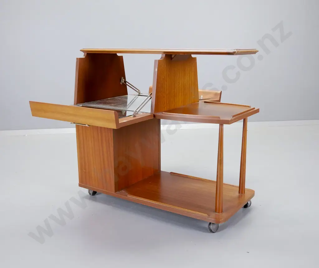 Craftrite NZ mid-century mahogany cocktail cabinet / serving trolley on casters, opens on both sides, w/ gilded metal Image 1++