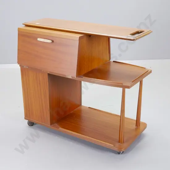 Craftrite NZ mid-century mahogany cocktail cabinet / serving trolley on casters, opens on both sides, w/ gilded metal