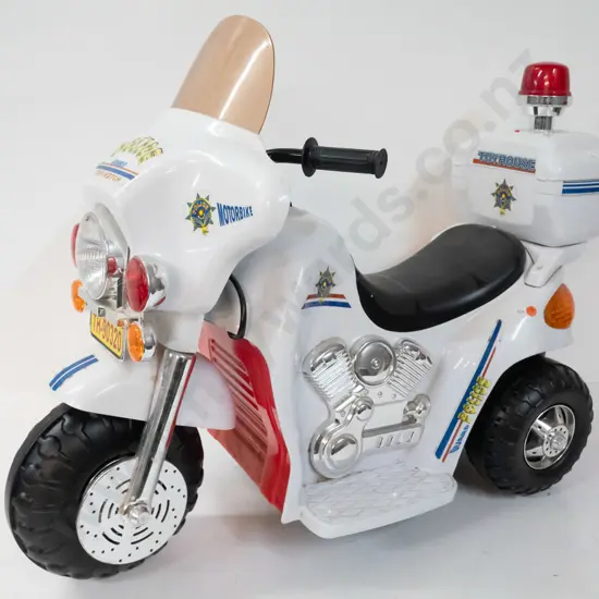 child's ride-on battery powered police motorcycle with siren, flashing light, forward and reverse gears - working,