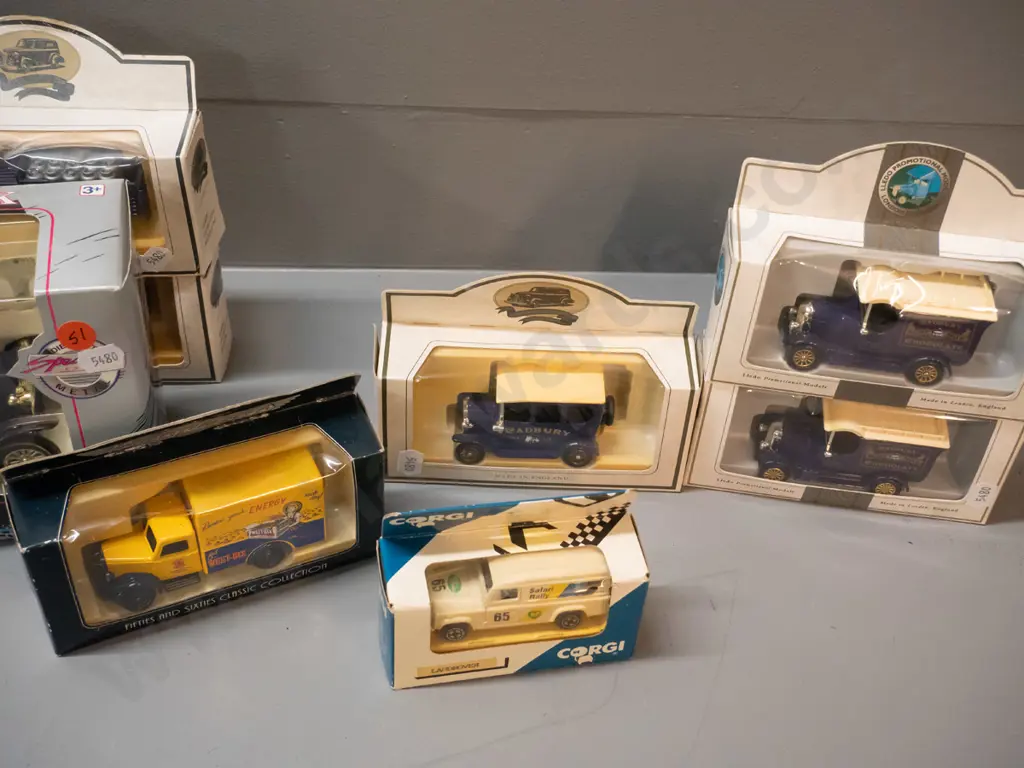 assorted die cast model vehicles - most are Cadbury delivery trucks, larger is a coin bank, 2 others Image 1++