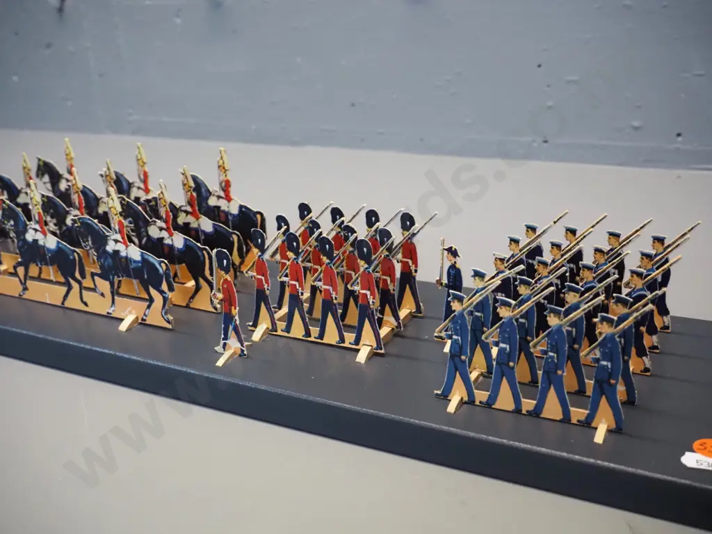 paper cut-out set of the 1953 Coronation procession of Queen Elizabeth II - mounted with wooden supports to a painted Image 1++