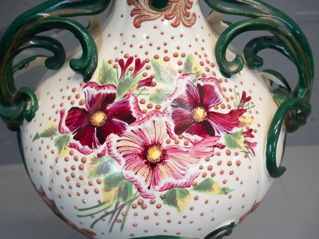 Victorian hand-painted floral motif handled vase - some flecks around base, putty residue around top rim H500 Image 1++