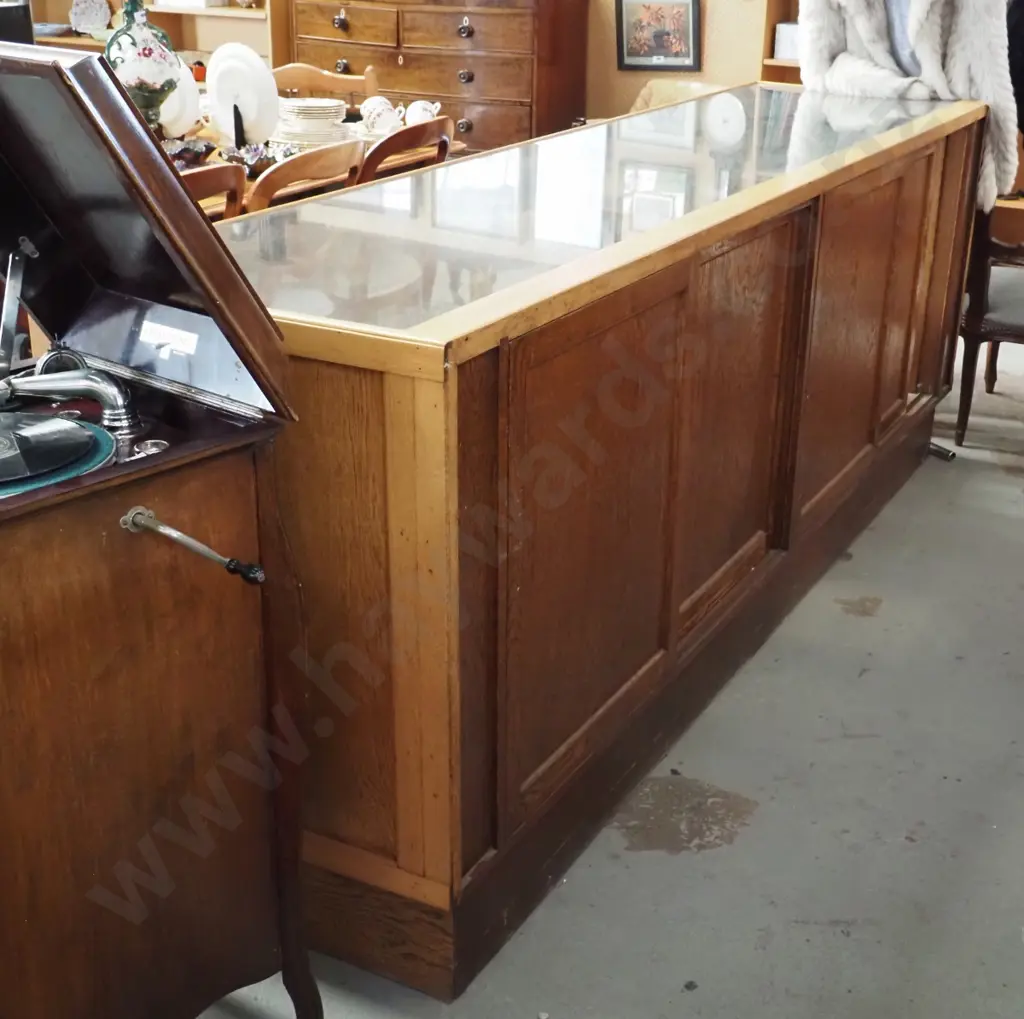 vintage very large glazed oak shop counter display cabinet with adjustable glass shelves, 4 sliding doors - scratches to Image 1++